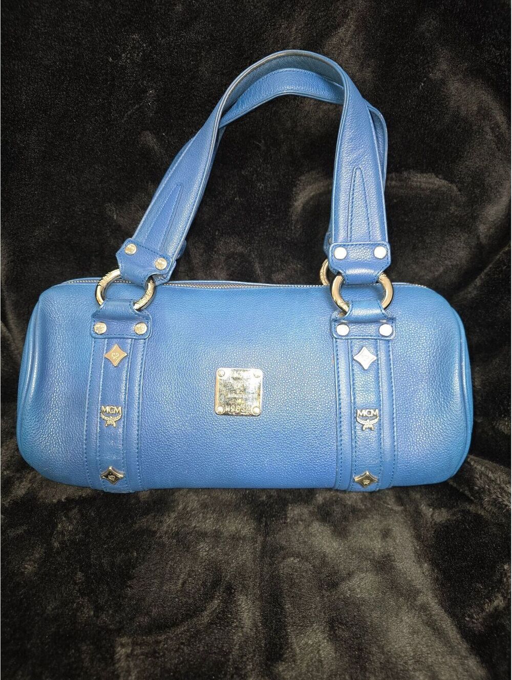 L86. MCM Papillon Blue Pebbled Leather bag w/COA